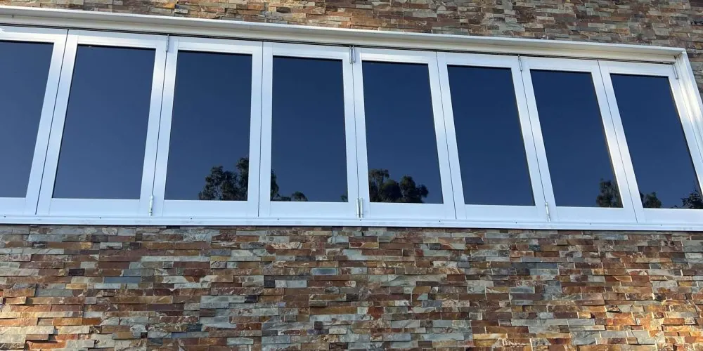 Reflective privacy film on a row of windows
